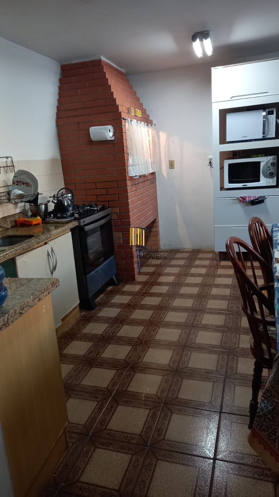 Casa 5 dormitórios no bairro Três Figueiras