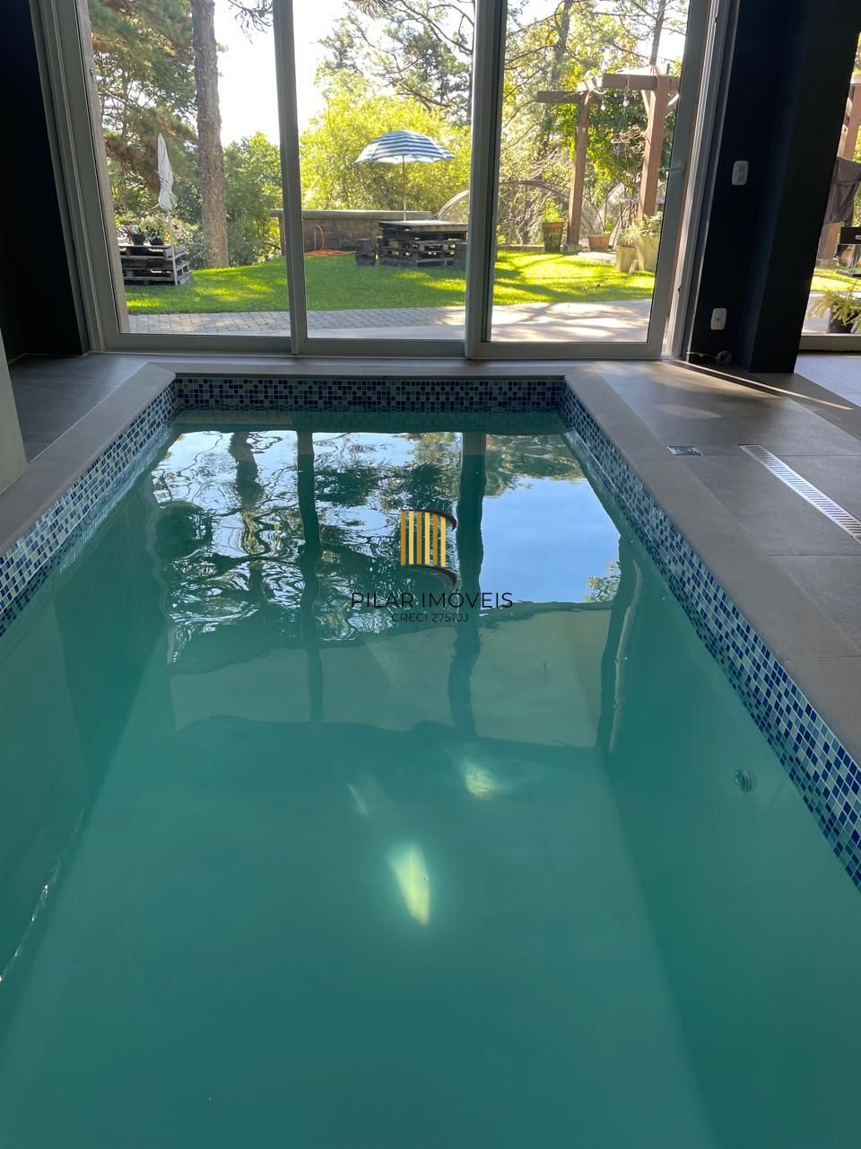 CASA COM PISCINA INDOOR NO CONDOMÍNIO VIVENDAS DA SERRA – CANELA/RS