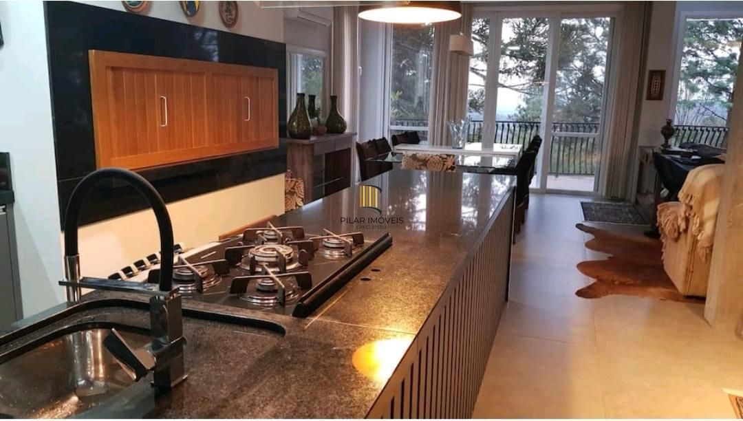 CASA COM PISCINA INDOOR NO CONDOMÍNIO VIVENDAS DA SERRA – CANELA/RS