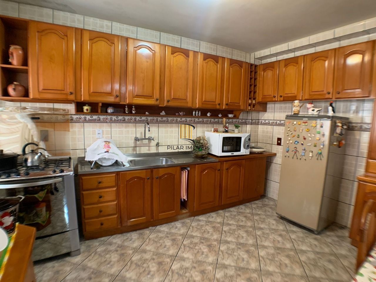 Casa para Venda - 318m², 3 dormitórios, Piscina, Bairro Guarujá