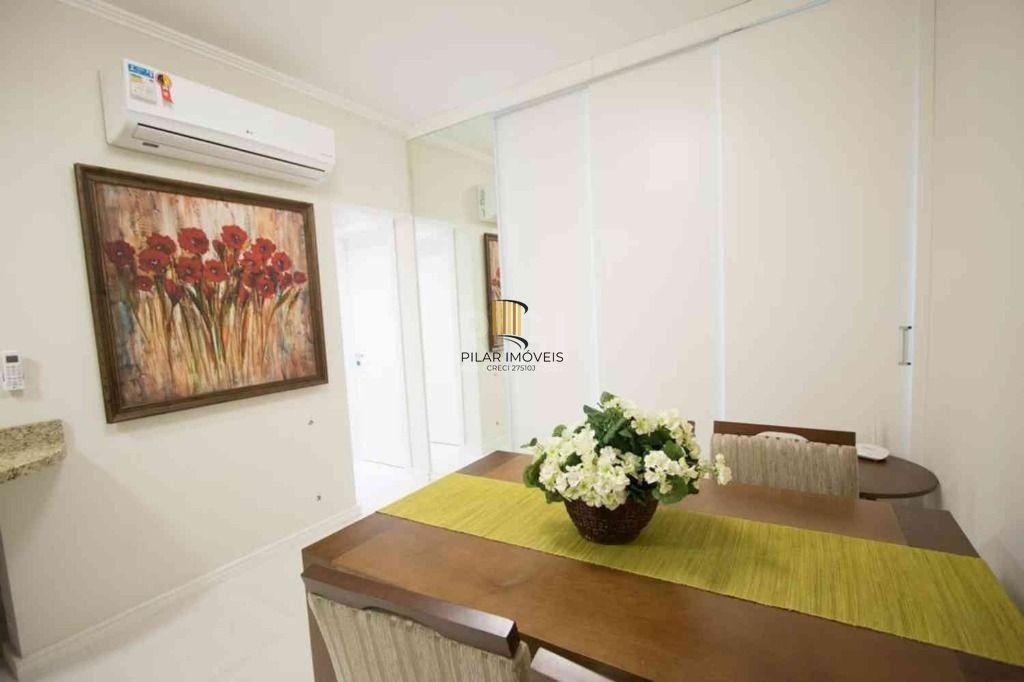 Apartamento com 1 dormitório para alugar, 52 m² por R$ 2.600,00