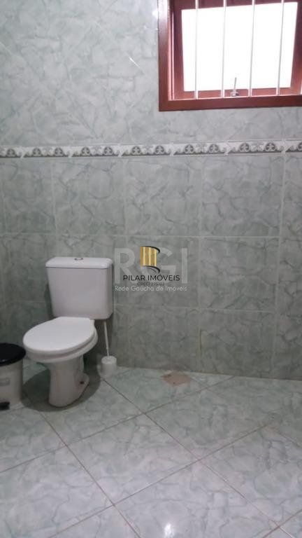 Casa com 3 dormitórios à venda, 230,11 m² por R$ 900.000,00 - Igara III - Canoas/RS