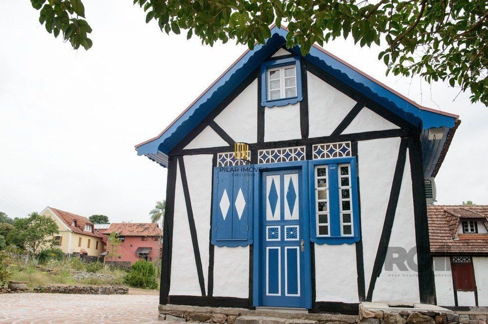 Área para comprar com casas Enxaimel em Nova Petrópolis.