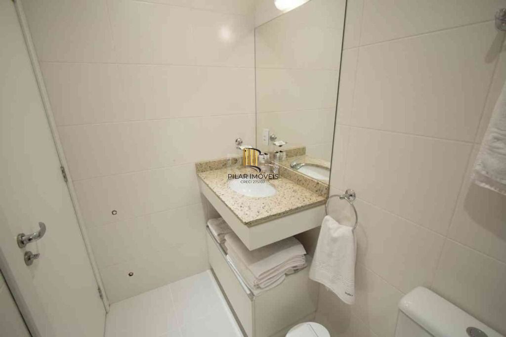 Apartamento com 1 dormitório para alugar, 52 m² por R$ 2.600,00