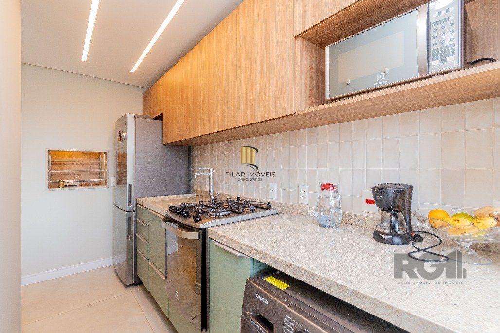 Apartamento á venda, 2 dormitórios, 2 vagas, no bairro Rio Branco, próximo à Redenção.