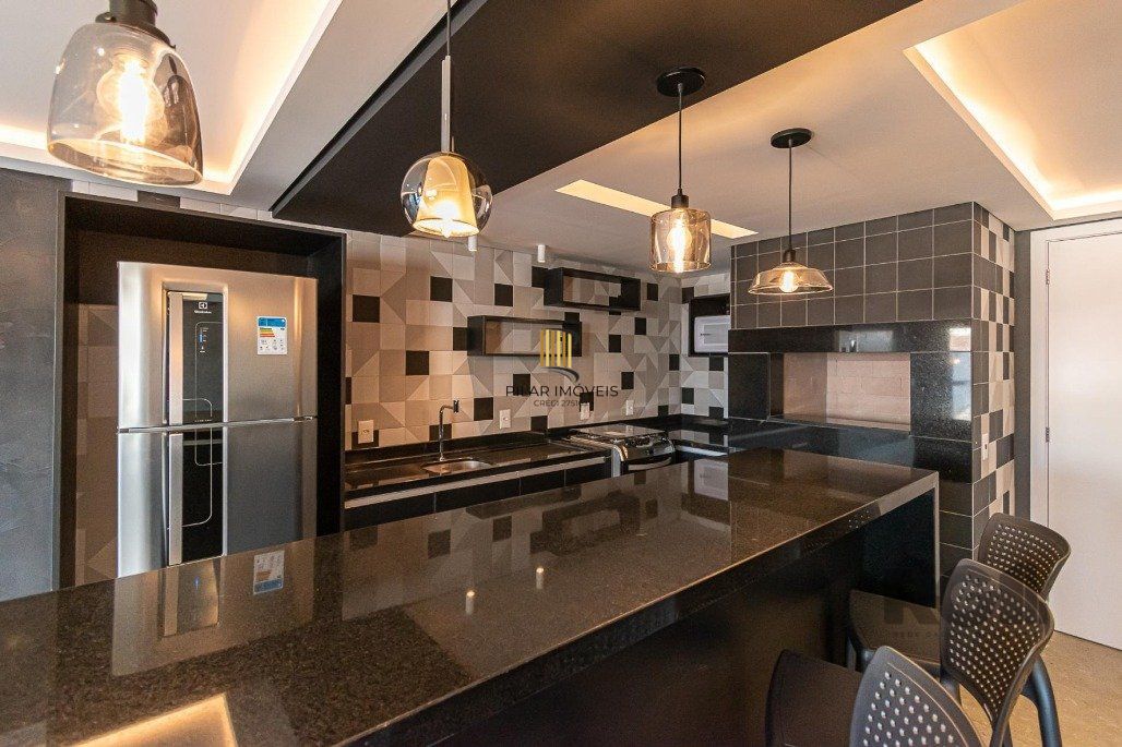 Apartamento á venda, 2 dormitórios, 2 vagas, no bairro Rio Branco, próximo à Redenção.