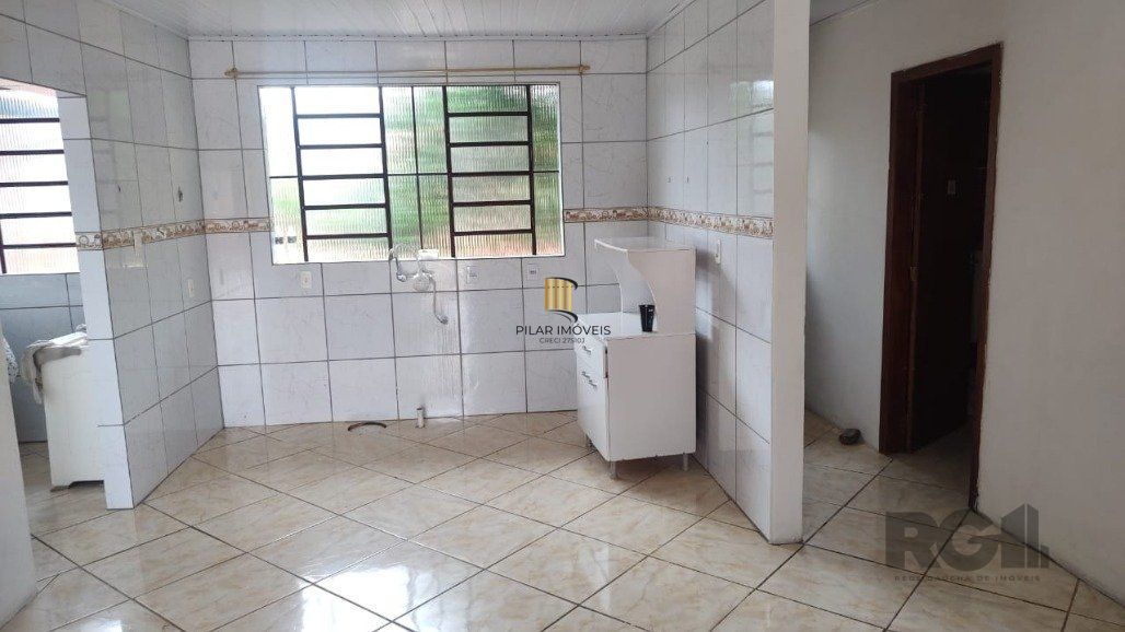 Vende casa com 84m² ,  2 dormitórios, terreno com 300m²