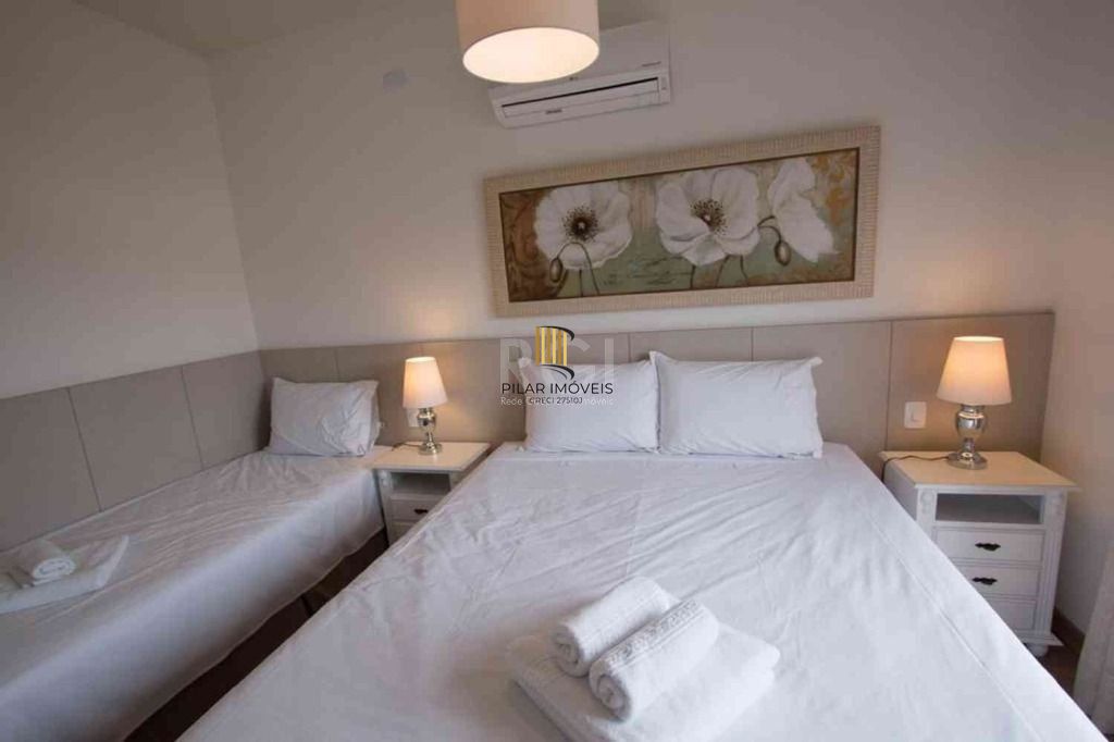 Apartamento com 1 dormitório para alugar, 52 m² por R$ 2.600,00