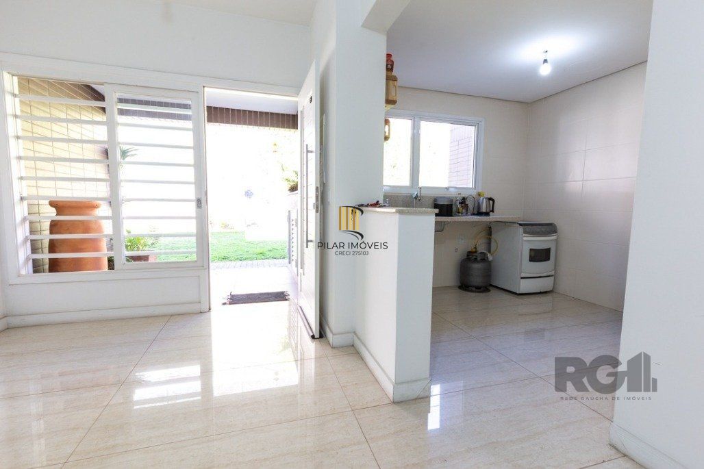 Casa Para comprar em Condomínio,3 dormitórios, deslumbrante vista para o Guaiba