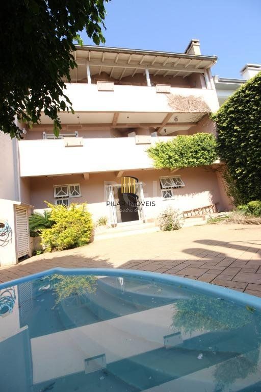 Casa para comprar com 4 dormitórios, 458 m² - Chácara das Pedras - Porto Alegre