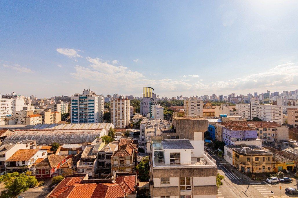 Apartamento á venda, 2 dormitórios, 2 vagas, no bairro Rio Branco, próximo à Redenção.