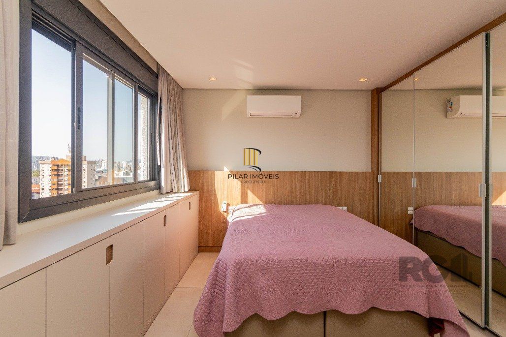 Apartamento á venda, 2 dormitórios, 2 vagas, no bairro Rio Branco, próximo à Redenção.