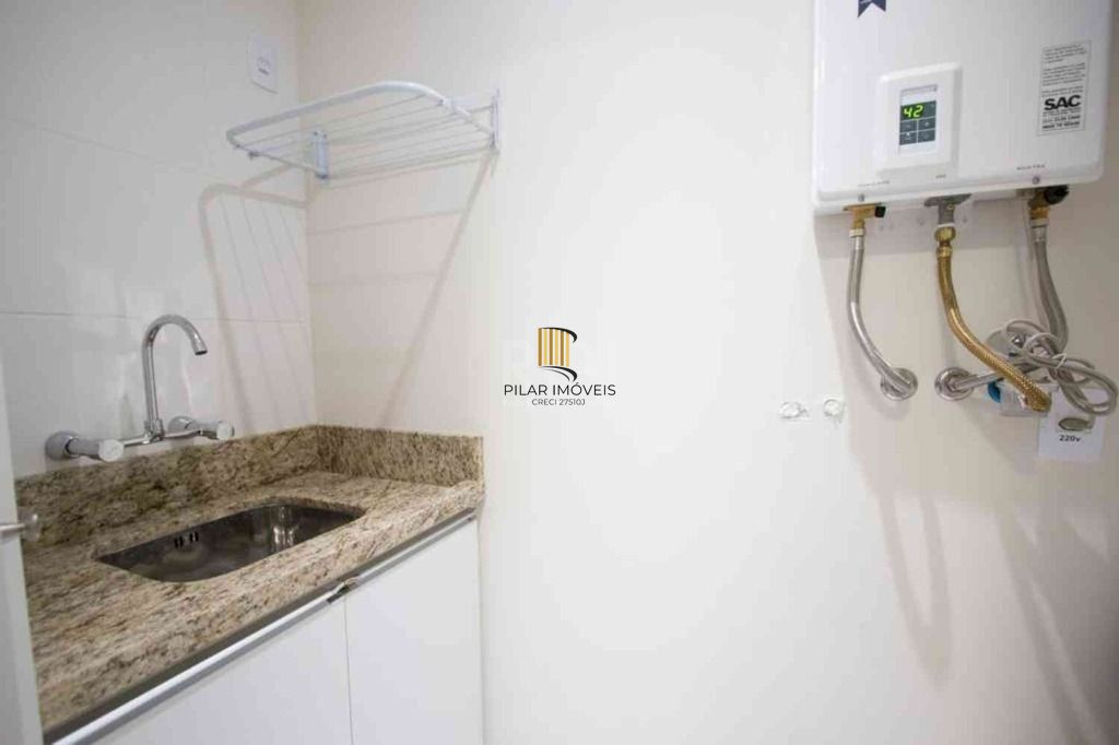 Apartamento com 1 dormitório para alugar, 52 m² por R$ 2.600,00