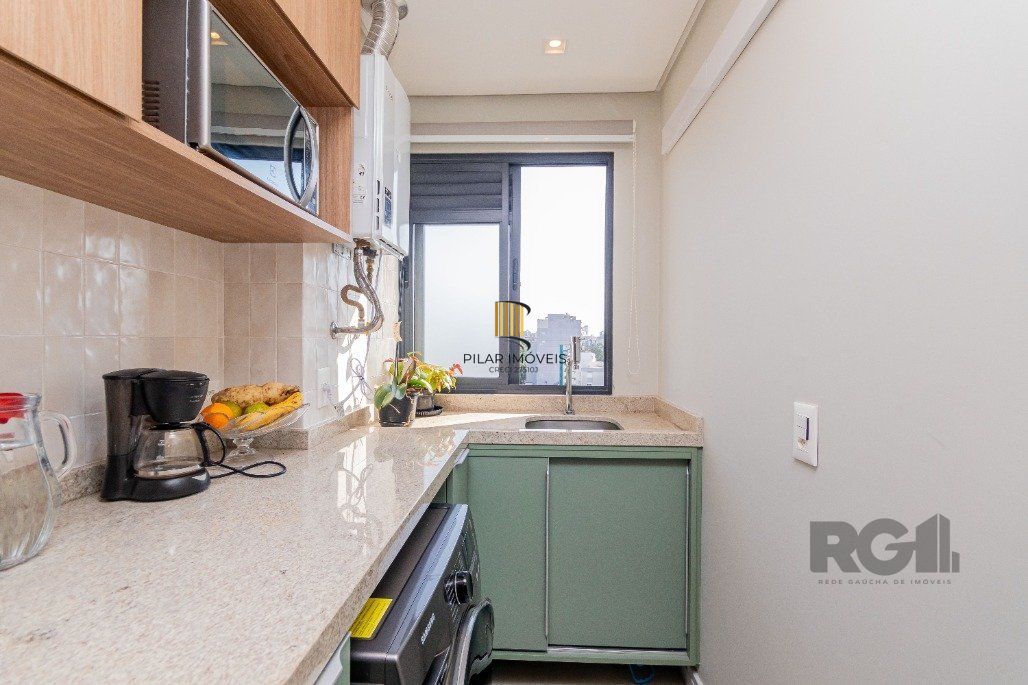 Apartamento á venda, 2 dormitórios, 2 vagas, no bairro Rio Branco, próximo à Redenção.