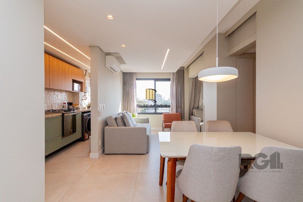 Apartamento á venda, 2 dormitórios, 2 vagas, no bairro Rio Branco, próximo à Redenção.