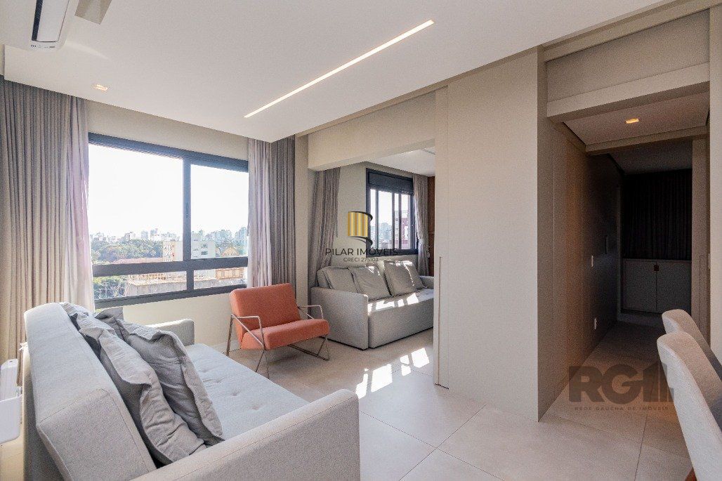 Apartamento á venda, 2 dormitórios, 2 vagas, no bairro Rio Branco, próximo à Redenção.