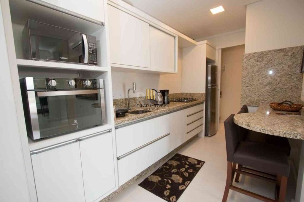 Apartamento com 1 dormitório para alugar, 52 m² por R$ 2.600,00
