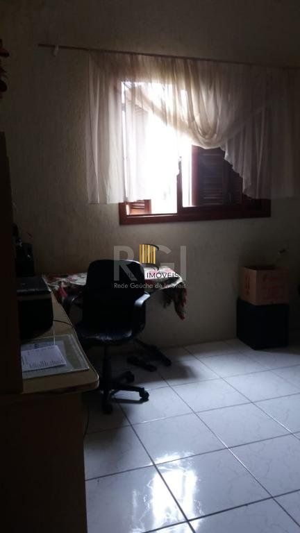 Casa com 3 dormitórios à venda, 230,11 m² por R$ 900.000,00 - Igara III - Canoas/RS