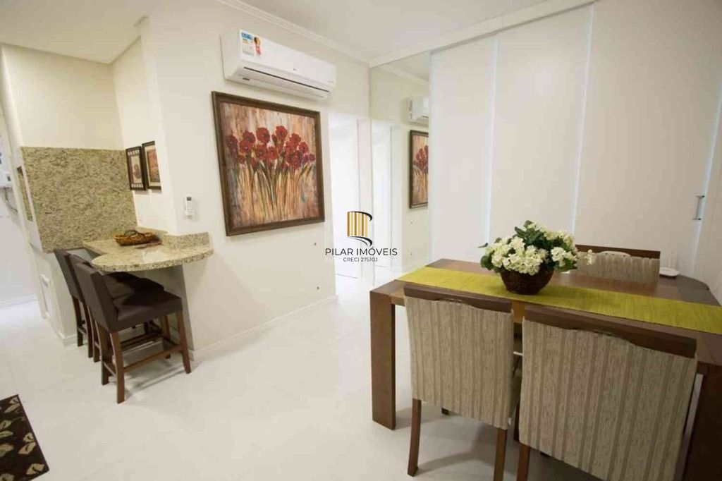Apartamento com 1 dormitório para alugar, 52 m² por R$ 2.600,00