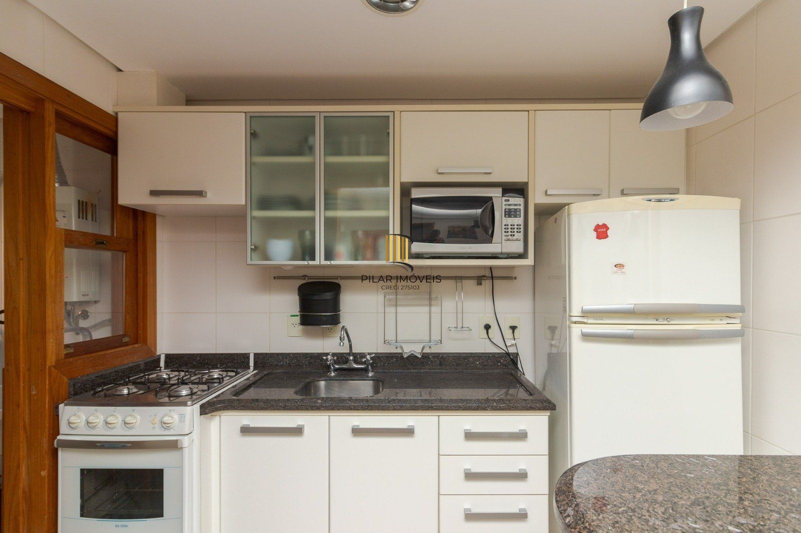 Charmoso apartamento semimobiliado no bairro Bela Vista