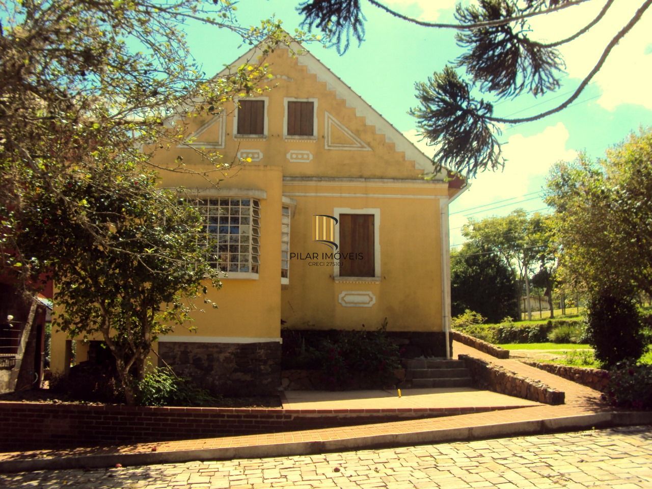 Área para comprar com casas Enxaimel em Nova Petrópolis.