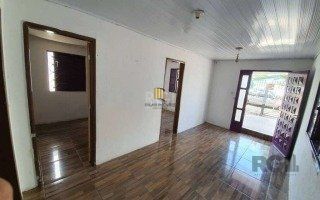 Vende terreno 300m², com 3 casas, casa da frente 2 dormitórios, sobrado nos fundos parte de baixo 2 dormitórios,1 banheiro sala cozinha conjugada,  em cima 3 dormitórios, 2 banheiros, sala e cozinha