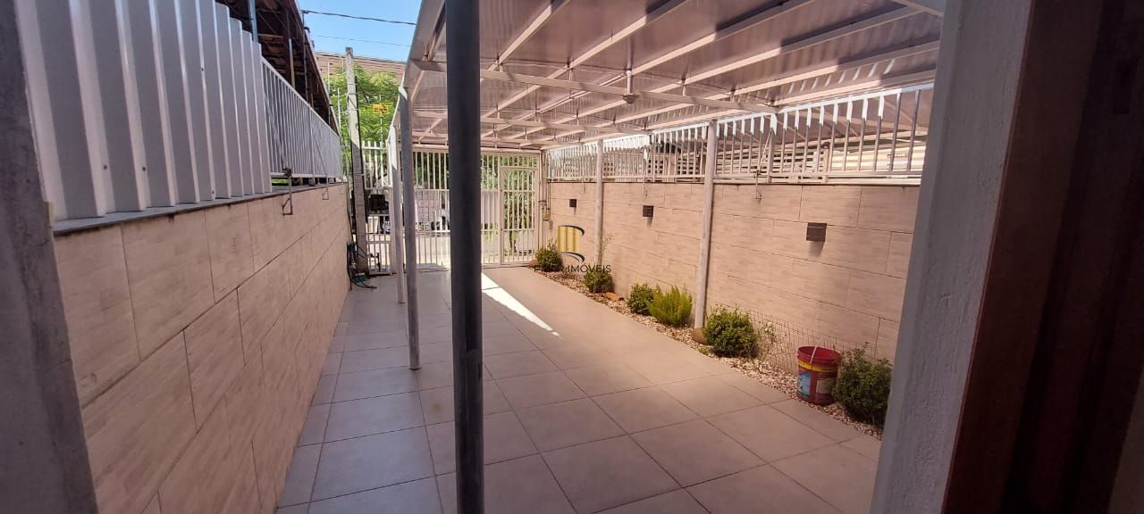 Boletto Imóveis vende casa em Canoas , 2 dormitórios, 1 banheiro, 1 lavabo, garagem para 2 carros,  com móveis fixos em MDF, em fino acabamento.