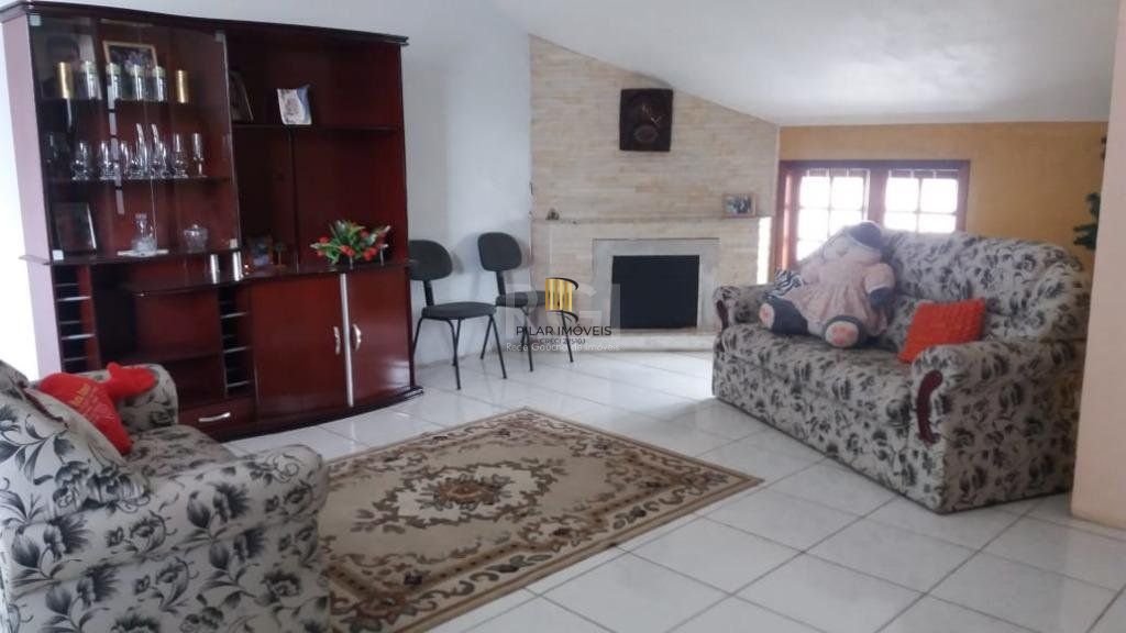 Casa com 3 dormitórios à venda, 230,11 m² por R$ 900.000,00 - Igara III - Canoas/RS