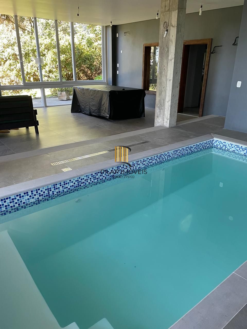 CASA COM PISCINA INDOOR NO CONDOMÍNIO VIVENDAS DA SERRA – CANELA/RS