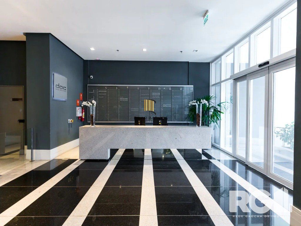 Sala para alugar totalmente mobiliada e decorada, 52 m² privativos divididos em 2 ambientes com vaga.