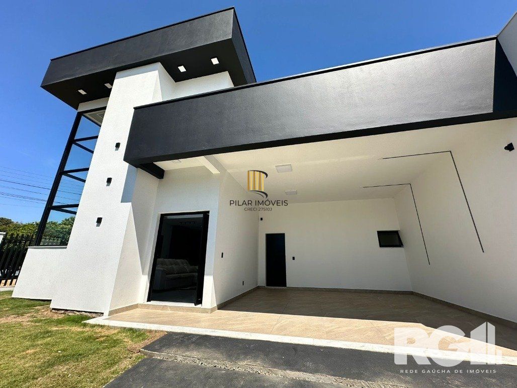 Casa de alto padrão a venda, totalmente mobiliada, com 2 dormitórios, 1 suite e 2 vagas no centro de Nova Santa Rita.