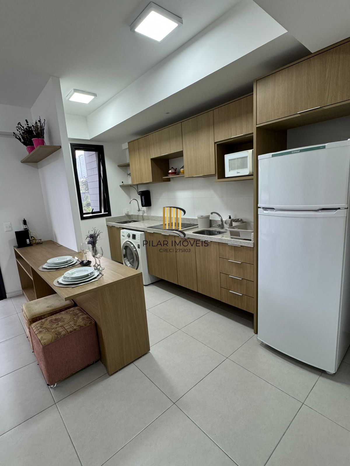 Apartamento de 42 m2 para alugar com 1 suíte, lavabo, churrasqueira e vaga no bairro Boa Vista em Porto Alegre.