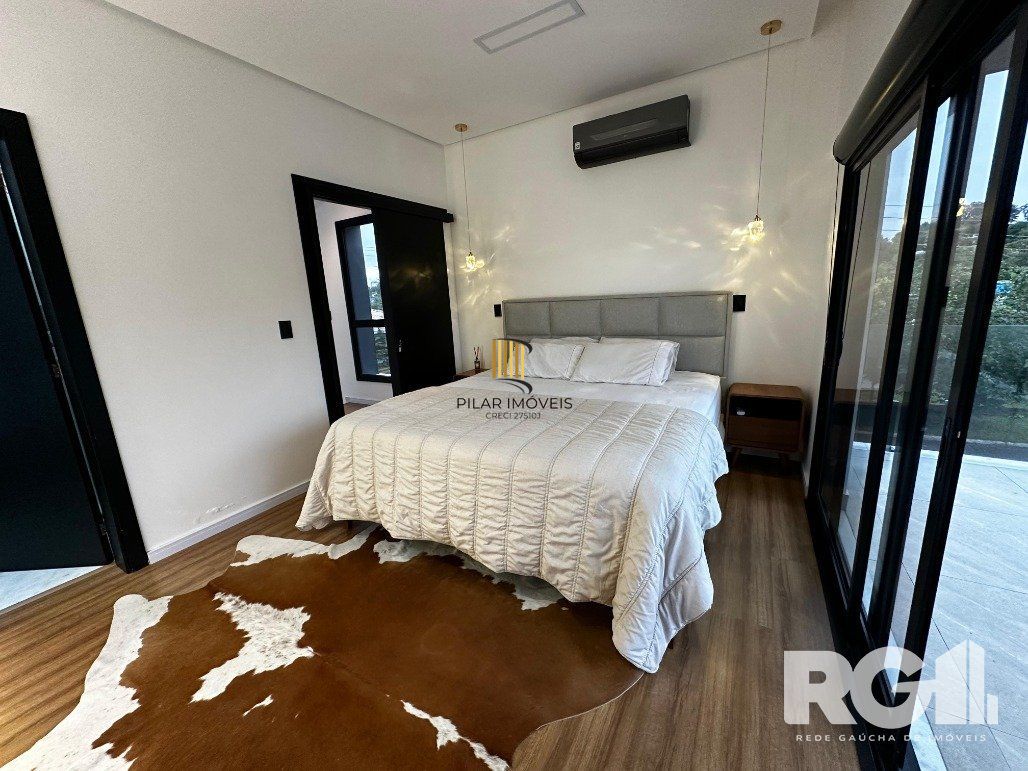 Casa de alto padrão a venda, totalmente mobiliada, com 2 dormitórios, 1 suite e 2 vagas no centro de Nova Santa Rita.