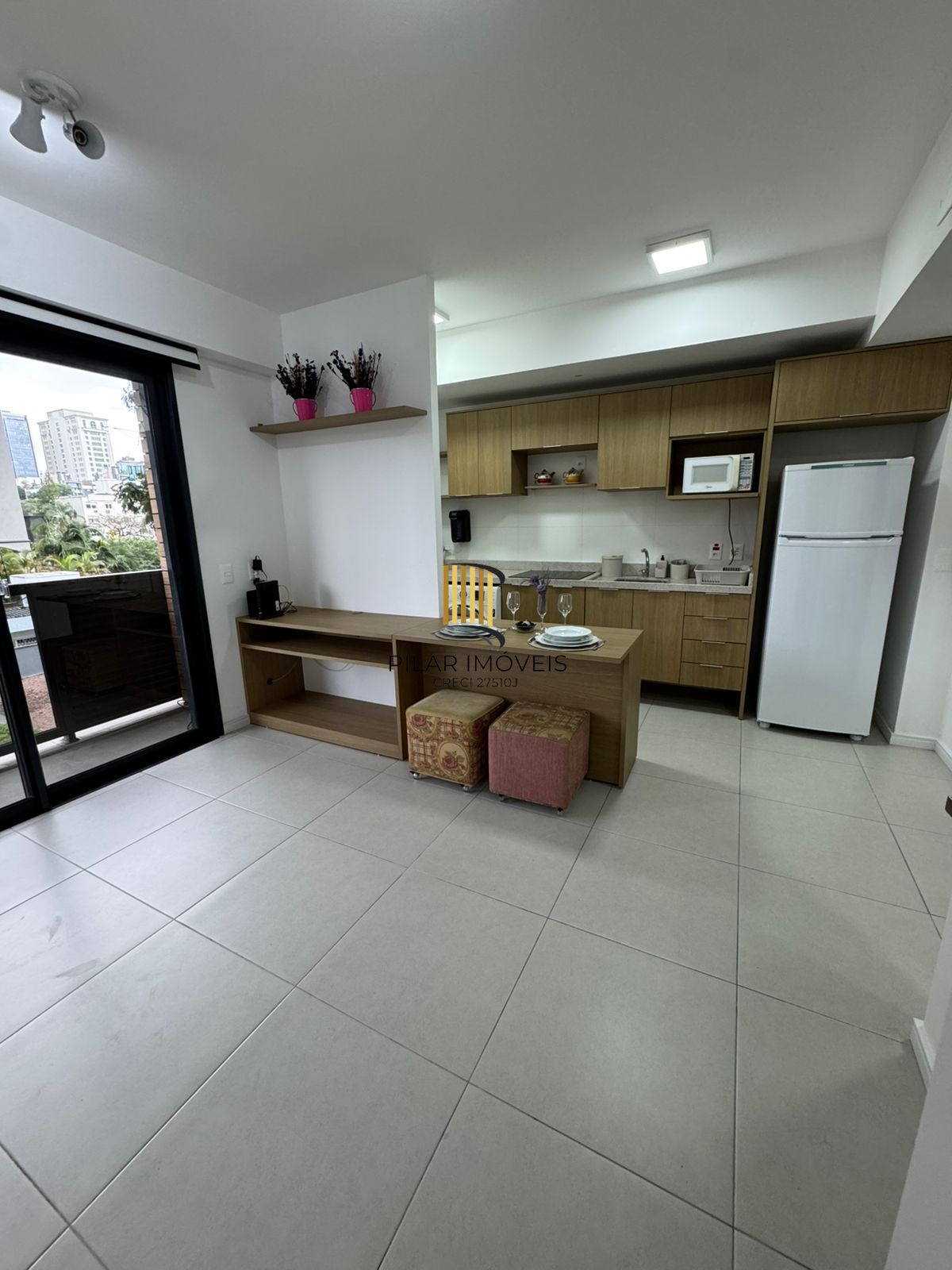 Apartamento de 42 m2 para alugar com 1 suíte, lavabo, churrasqueira e vaga no bairro Boa Vista em Porto Alegre. - Pilar Imóveis