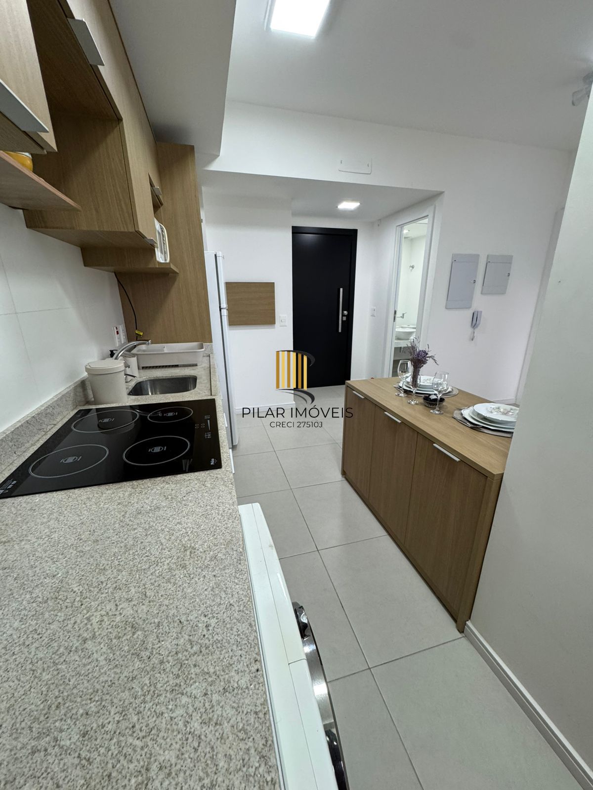 Apartamento de 42 m2 para alugar com 1 suíte, lavabo, churrasqueira e vaga no bairro Boa Vista em Porto Alegre.