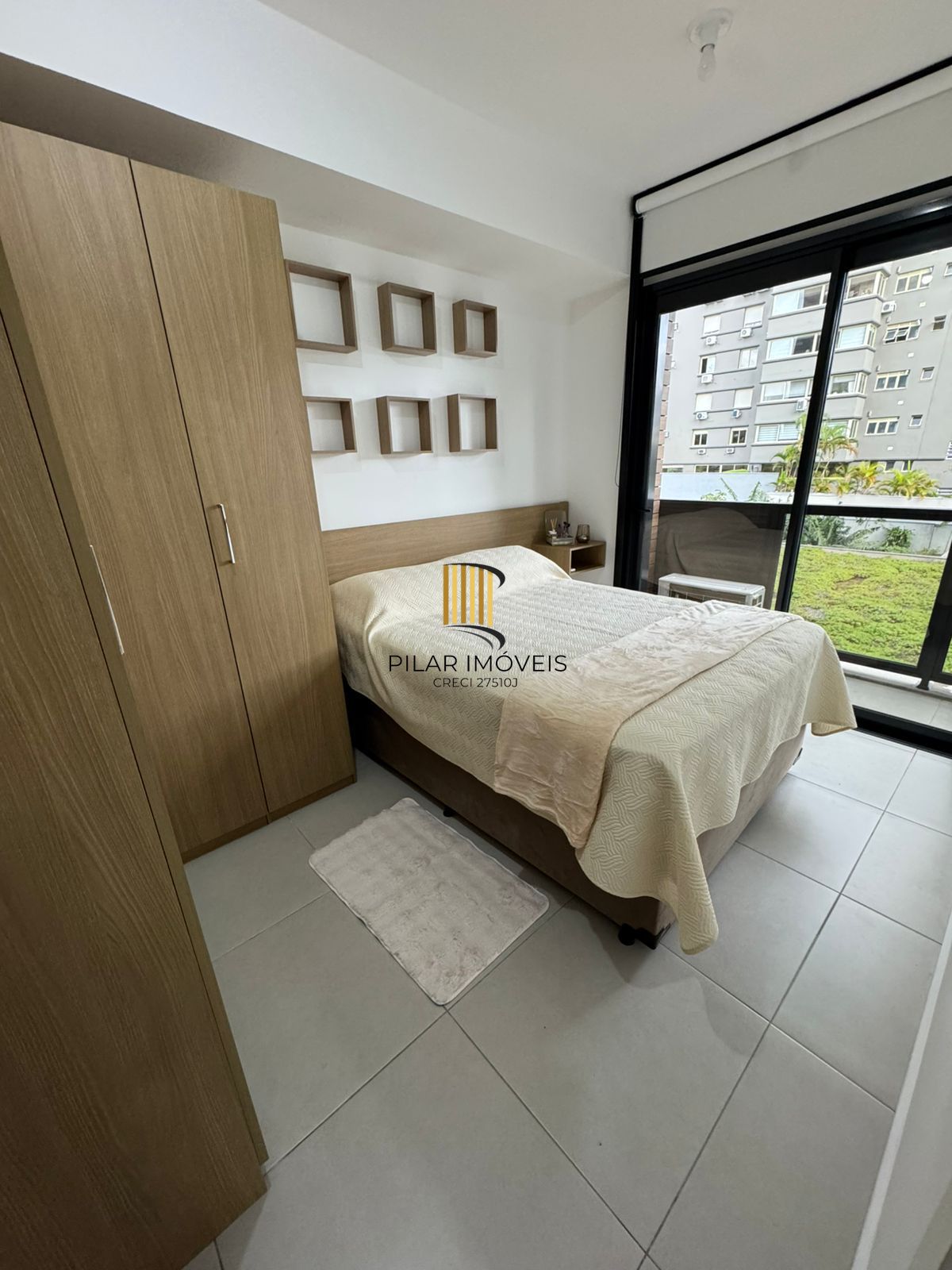 Apartamento de 42 m2 para alugar com 1 suíte, lavabo, churrasqueira e vaga no bairro Boa Vista em Porto Alegre.