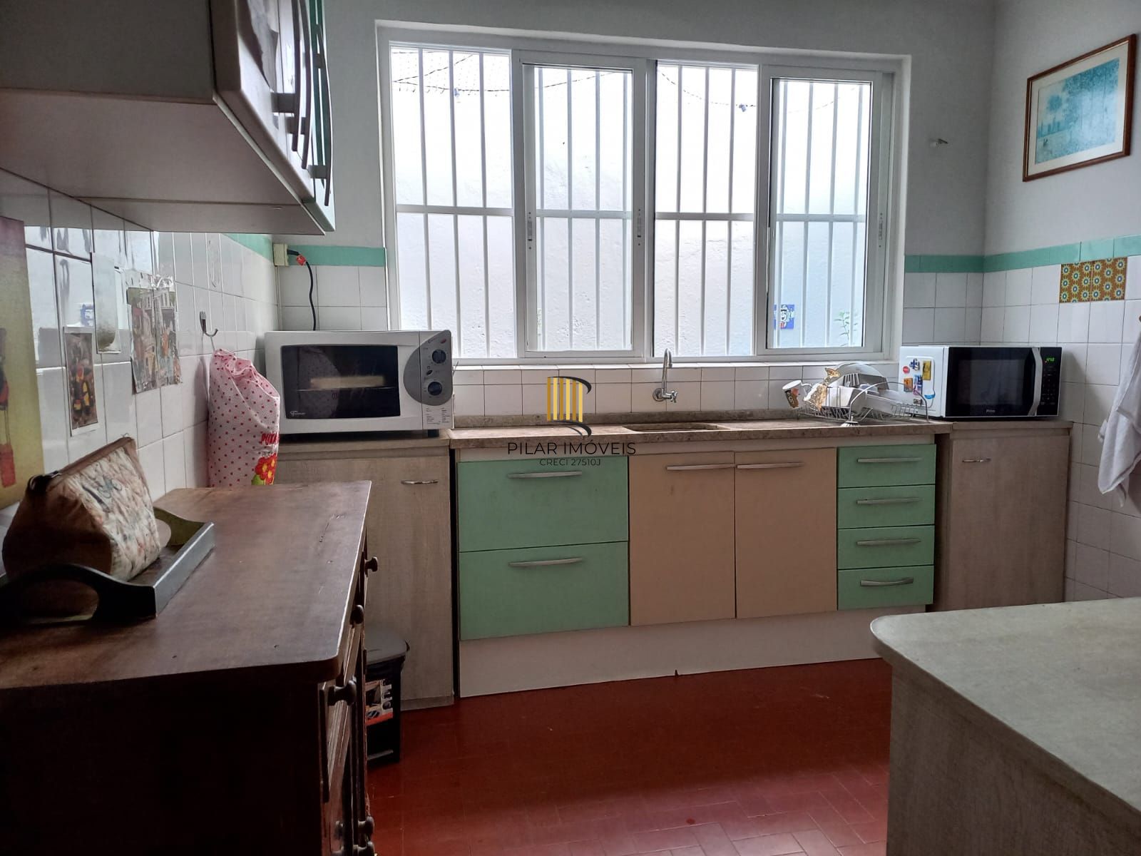 Casa residencial aconchegante com ampla área da lazer com churrasqueira.