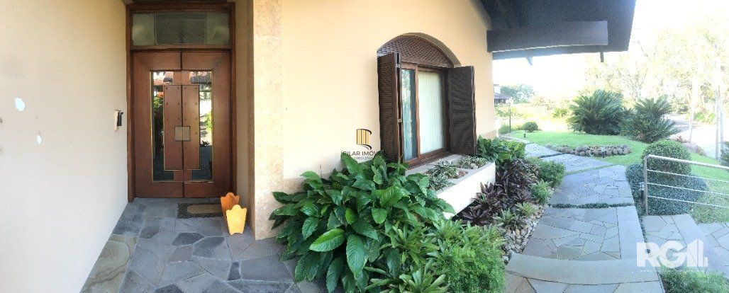 Casa de Condomínio 3 dormitórios no bairro Cavalhada