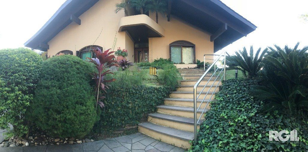 Casa de Condomínio 3 dormitórios no bairro Cavalhada