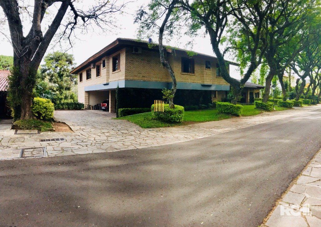 Casa de Condomínio 7 dormitórios no bairro Cavalhada
