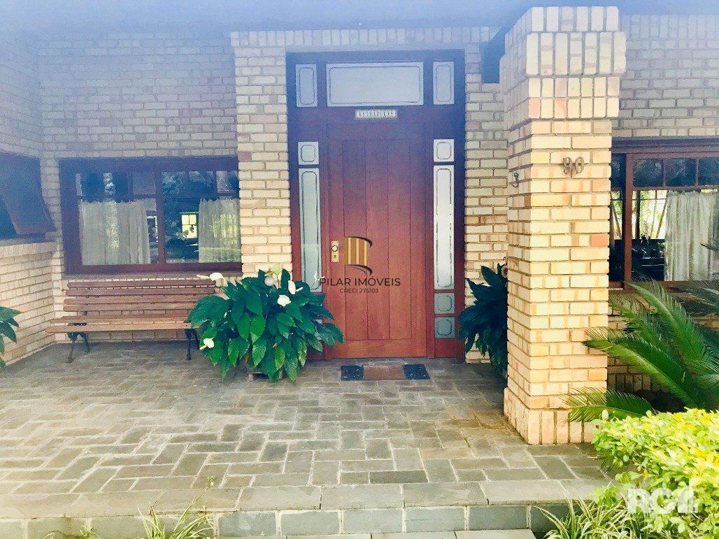 Casa de Condomínio 7 dormitórios no bairro Cavalhada