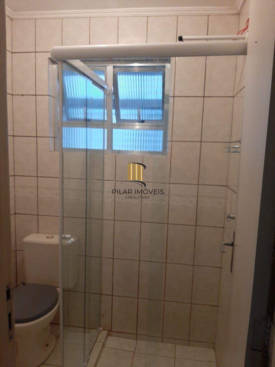 Apartamento de 3 quartos e vaga de garagem rotativa no Bairro Cristal em Porto Alegre/RS