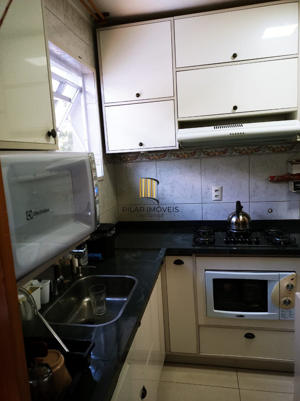Apartamento com 2 Quartos,com box,no Bairro Humaitá