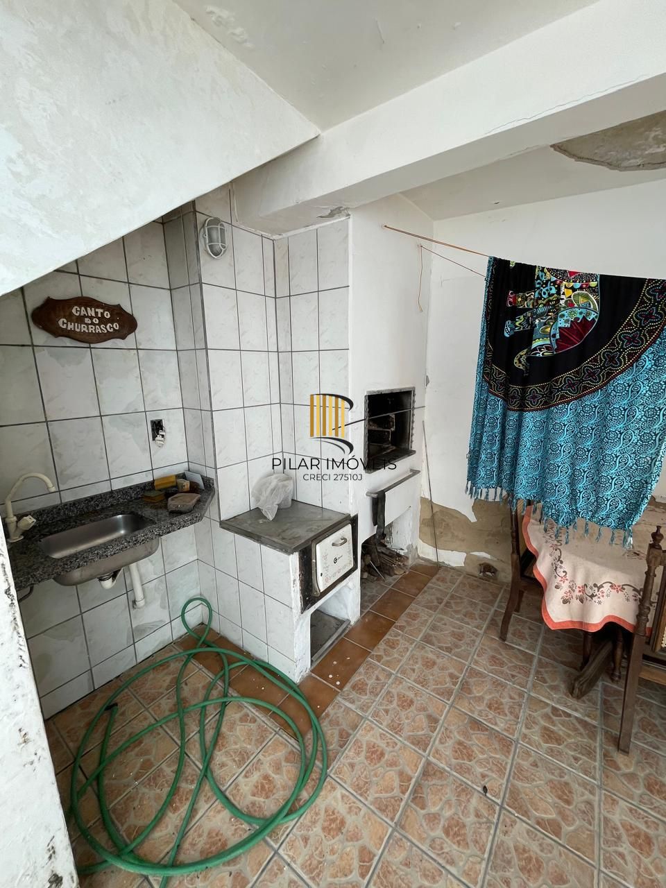 Casa 5 dormitórios no bairro Partenon