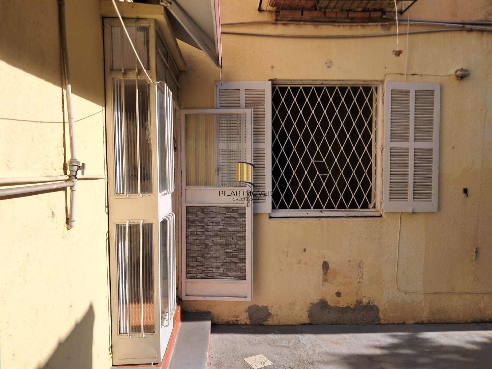 2D Térreo com dependência externa e pátio.  67,45m² Auxiliadora - Preço convidativo!