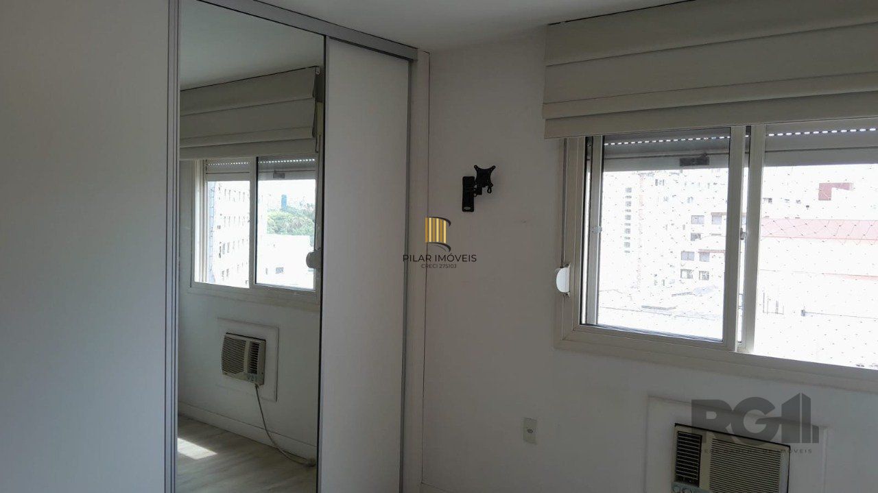 Apartamento semi- mobiliado 02 dormitórios, 01 suíte,andar alto,na Cidade Baixa