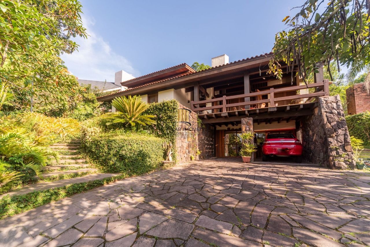 Casa 3 dormitórios no bairro Cavalhada - Pilar Imóveis