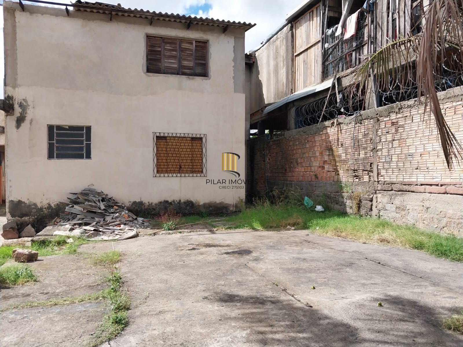 Terreno com prédio, Oportunidade excelente para construir Edifício