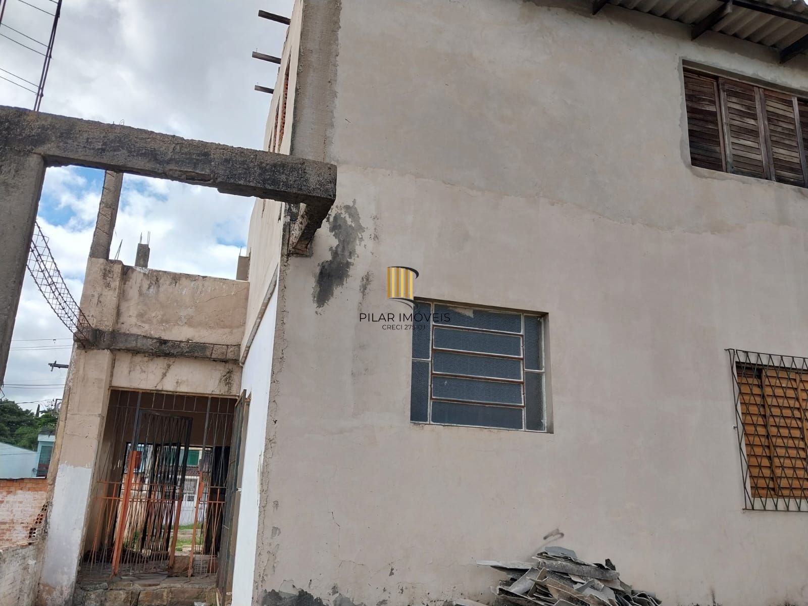 Terreno com prédio, Oportunidade excelente para construir Edifício
