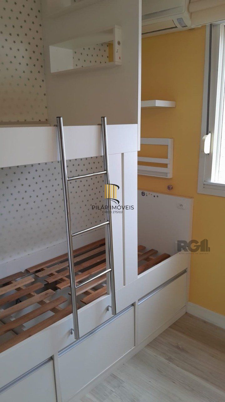 Apartamento semi- mobiliado 02 dormitórios, 01 suíte,andar alto,na Cidade Baixa